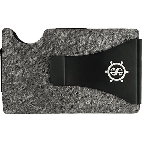 3. Close-up of Tume Kask cardholder with black money clip featuring logo on slate stone