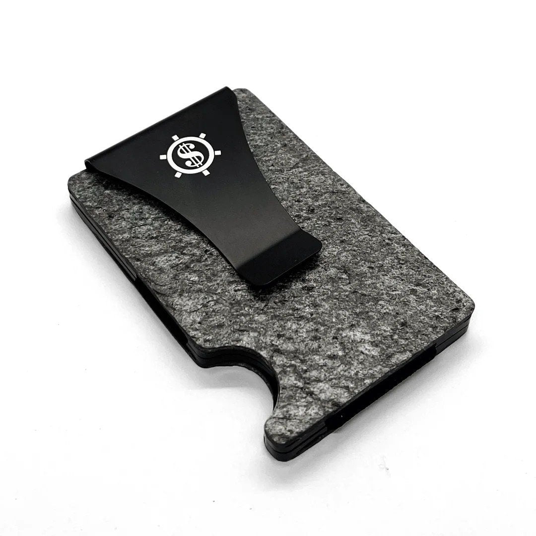 5. Tume Kask cardholder with black money clip shown at an angle highlighting slate texture