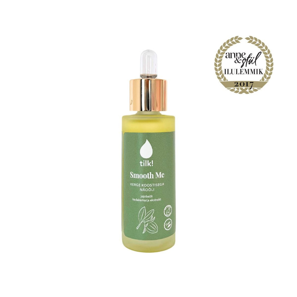 2. Award-winning Tilk! Smooth Me Face Oil with juniper berry extract, 30ml bottle with dropper, studio shot with award badge
