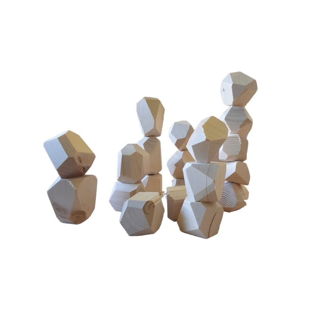 1. Uniquely shaped pinewood building blocks stacked in various formations showcasing different sanded sides