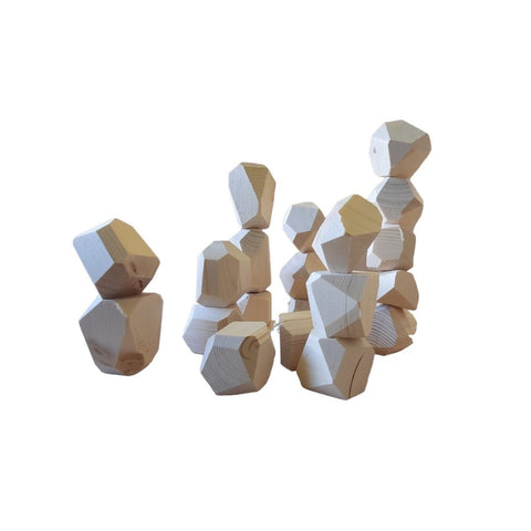 1. Uniquely shaped pinewood building blocks stacked in various formations showcasing different sanded sides