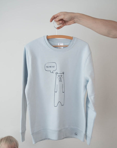 3. Light Blue oversized sweatshirt by Black Giraffe Brand with 'You are hot' bear graphic, displayed on hanger
