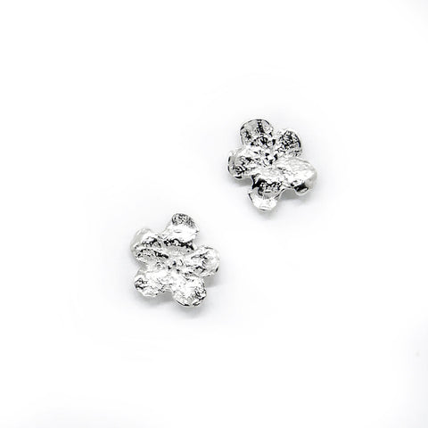 4. Silver-plated SPRING Forget-Me-Not earrings by Agnes Veski Jewellery, made from 925 silver, shown in studio