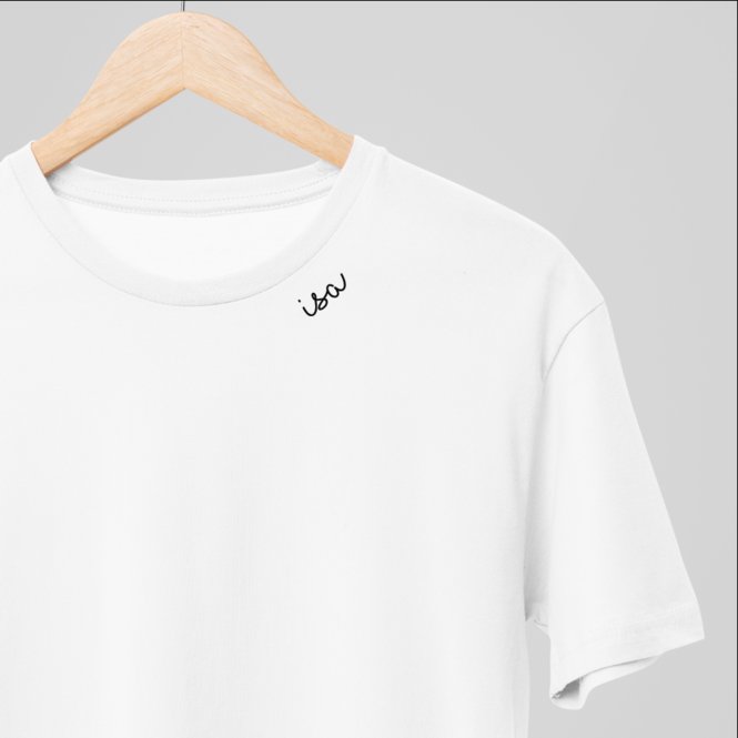 6. Studio shot of white organic cotton T-shirt by Beebila on hanger, featuring embroidered collar