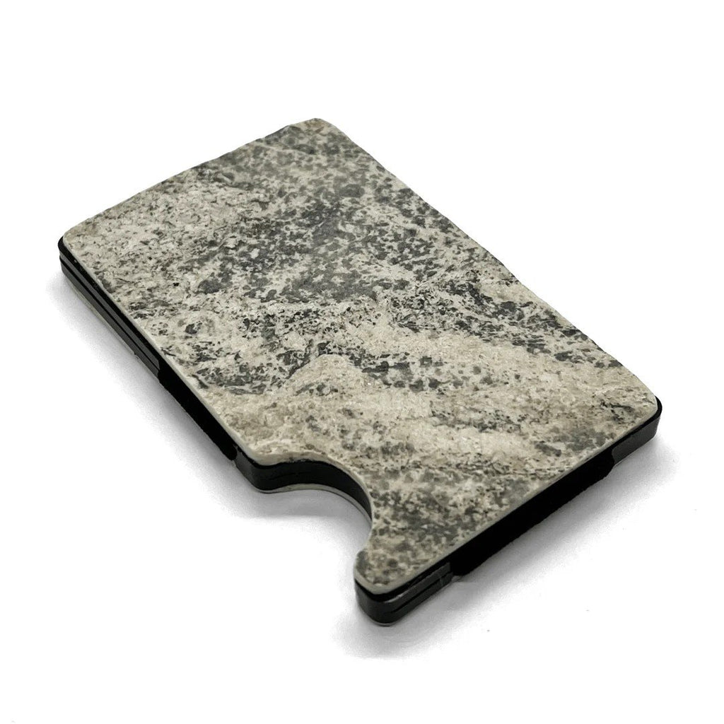 5. Angled view of Mere Marmor cardholder highlighting natural marble texture and sleek design