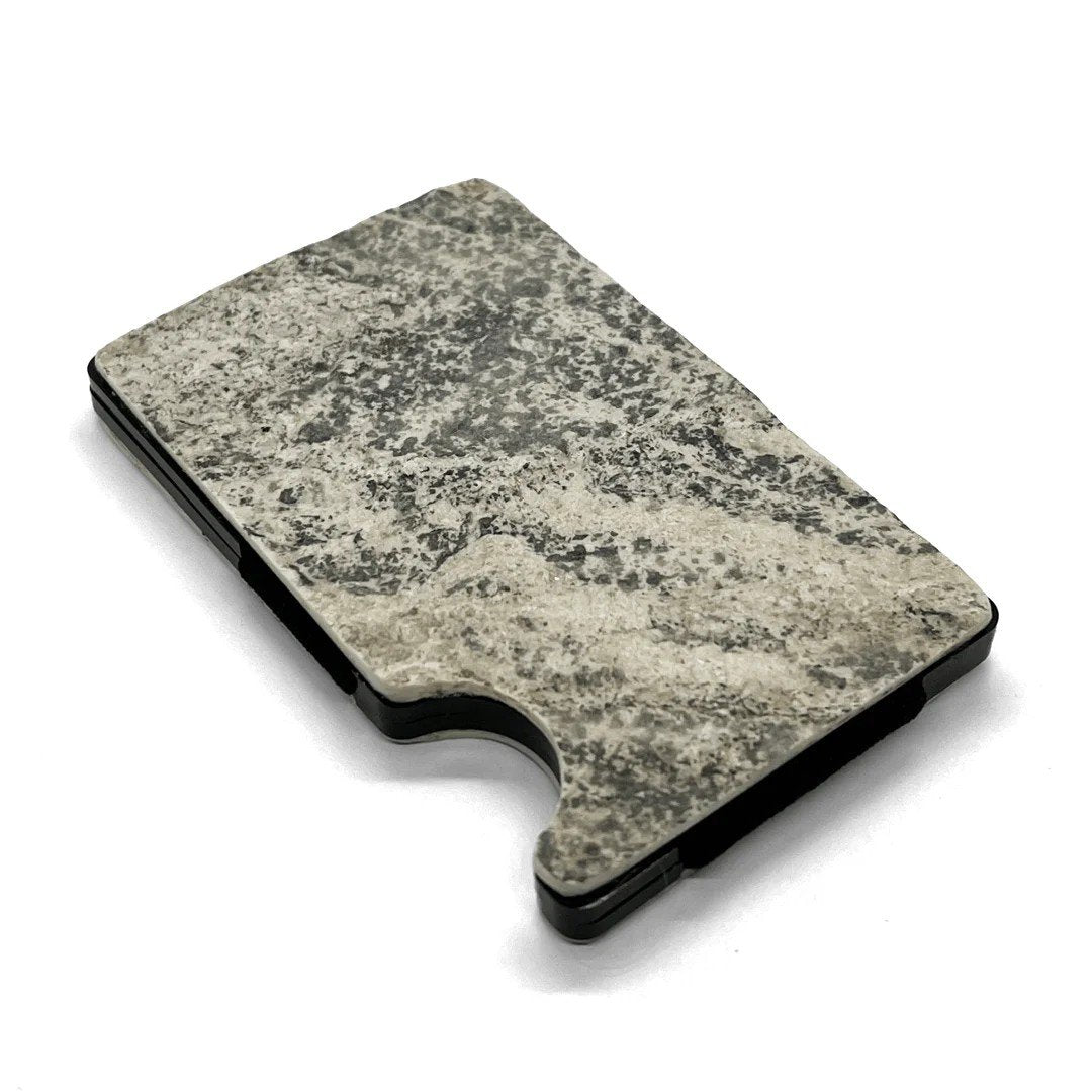 5. Angled view of Mere Marmor cardholder highlighting natural marble texture and sleek design