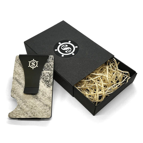 1. Mere Marmor cardholder with black money clip and natural marble design, shown with eco-friendly packaging featuring straw filling and Seif Design logo