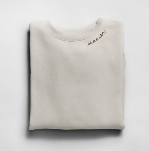 2. Beige Vanaisa sweatshirt by Beebila with embroidered collar, folded in studio setting
