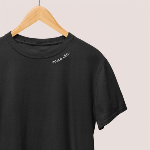 3. Studio shot of black unisex organic cotton t-shirt with embroidered 'Vanaisa' collar on hanger