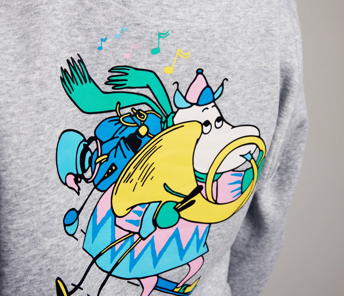 6. Close-up of Hemulens design on grey Moomin by NordicBuddies hoodie