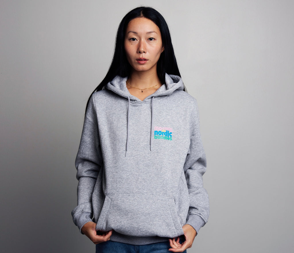1. Women's grey Moomin by NordicBuddies unisex heavy cotton hoodie, front view in studio