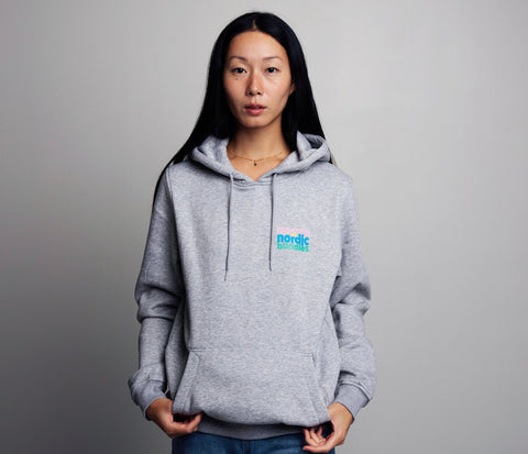 1. Women's grey Moomin by NordicBuddies unisex heavy cotton hoodie, front view in studio