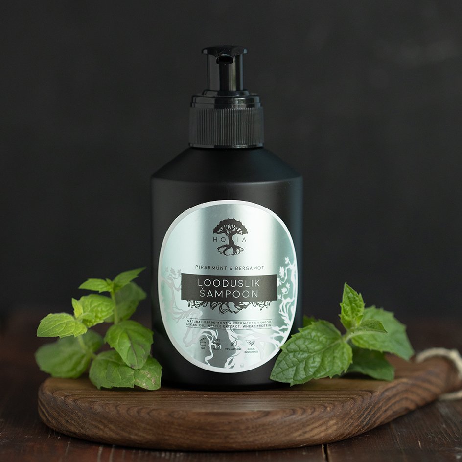 1. HOIA homespa Organic Shampoo Peppermint & Bergamot 200ml bottle with mint leaves, shown on wooden surface