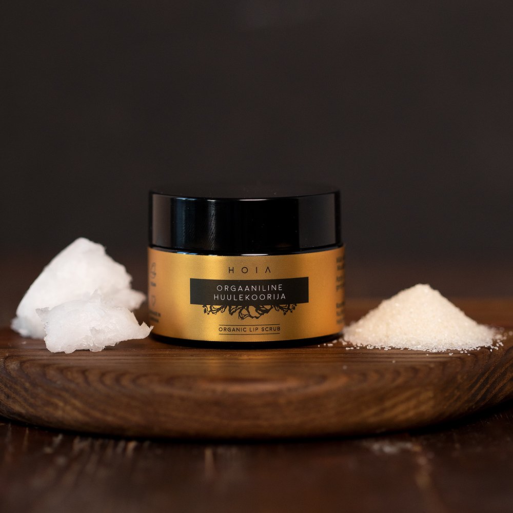 3. HOIA homespa organic lip scrub jar with coconut oil and sugar on wooden surface