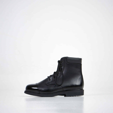 1. Unisex black leather ankle boots by Samelin, side view in studio setting