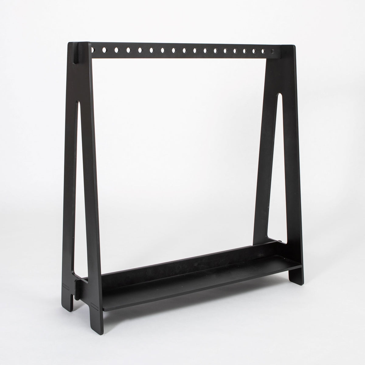14. Black toddler clothing rack with sleek design on a white background