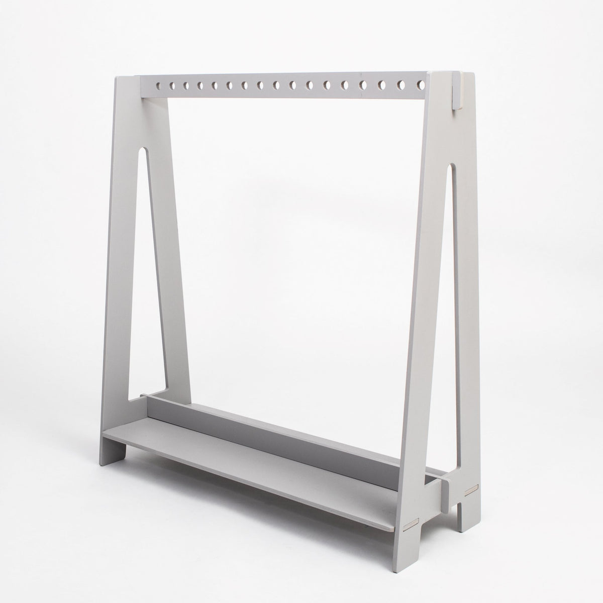 12. Grey toddler clothing rack with minimalist design on a white background