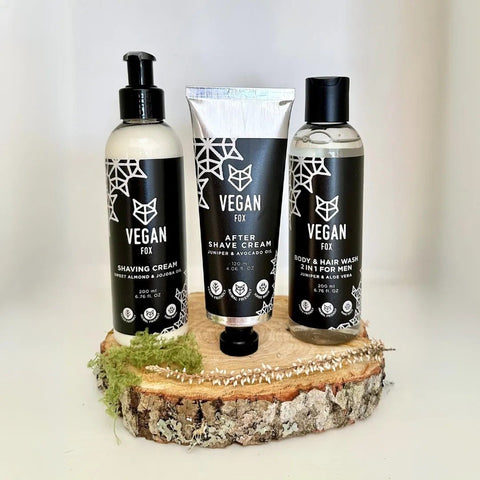 2. Vegan Fox men's grooming set displayed on a wooden base, featuring shaving cream, after shave cream, and 2-in-1 body and hair wash