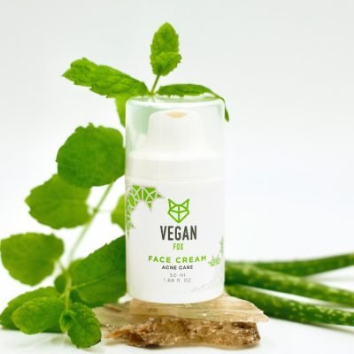 2. Vegan Fox Acne Care Face Cream 50 ml bottle with natural ingredients, shown with mint leaves and aloe vera