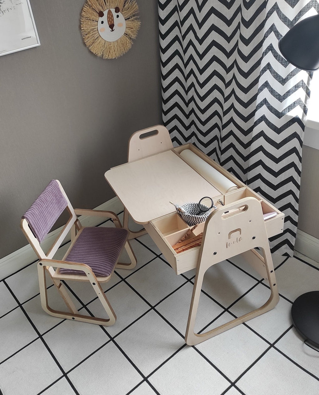 5. Children's chair in cannon pink with matching desk in a playroom setting