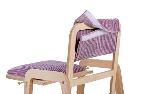 3. Close-up of removable padded backrest on children's chair in cannon pink