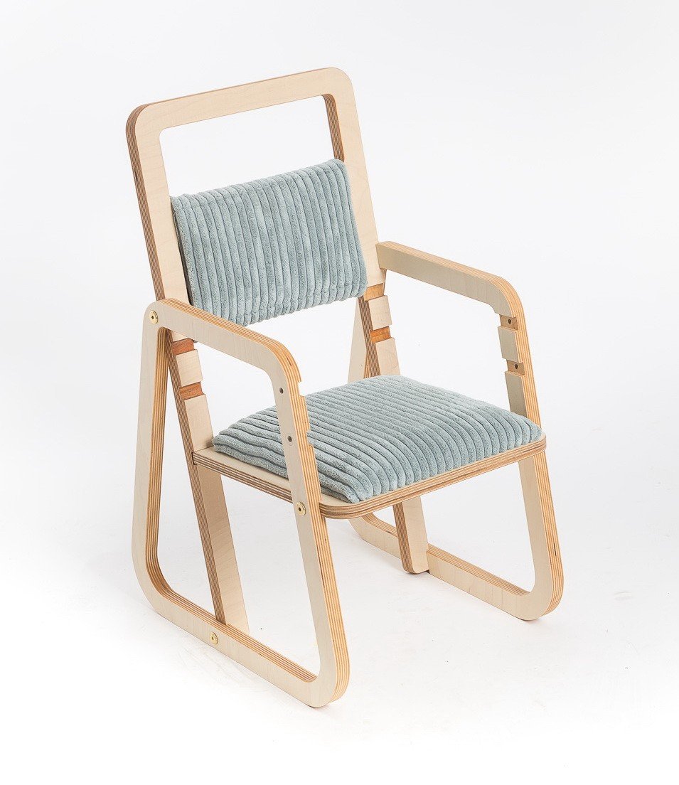 8. Front view of mint green children's chair with natural wood frame on white background