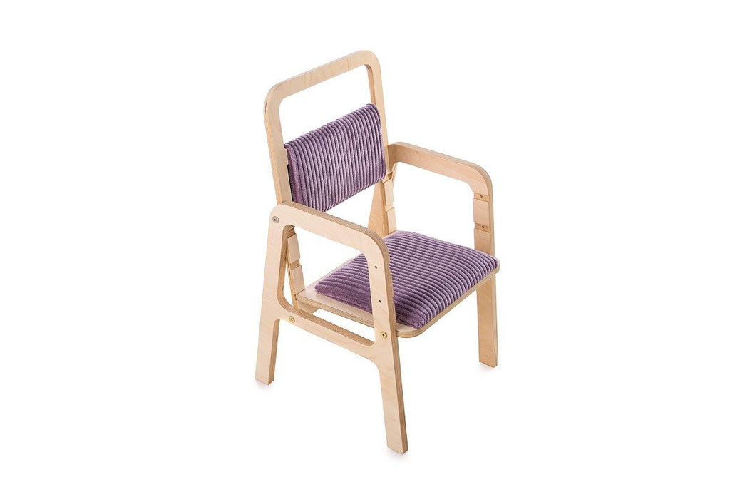 2. Adjustable children's chair in cannon pink with padded seat and backrest, made from Baltic birch plywood, shown in studio setting