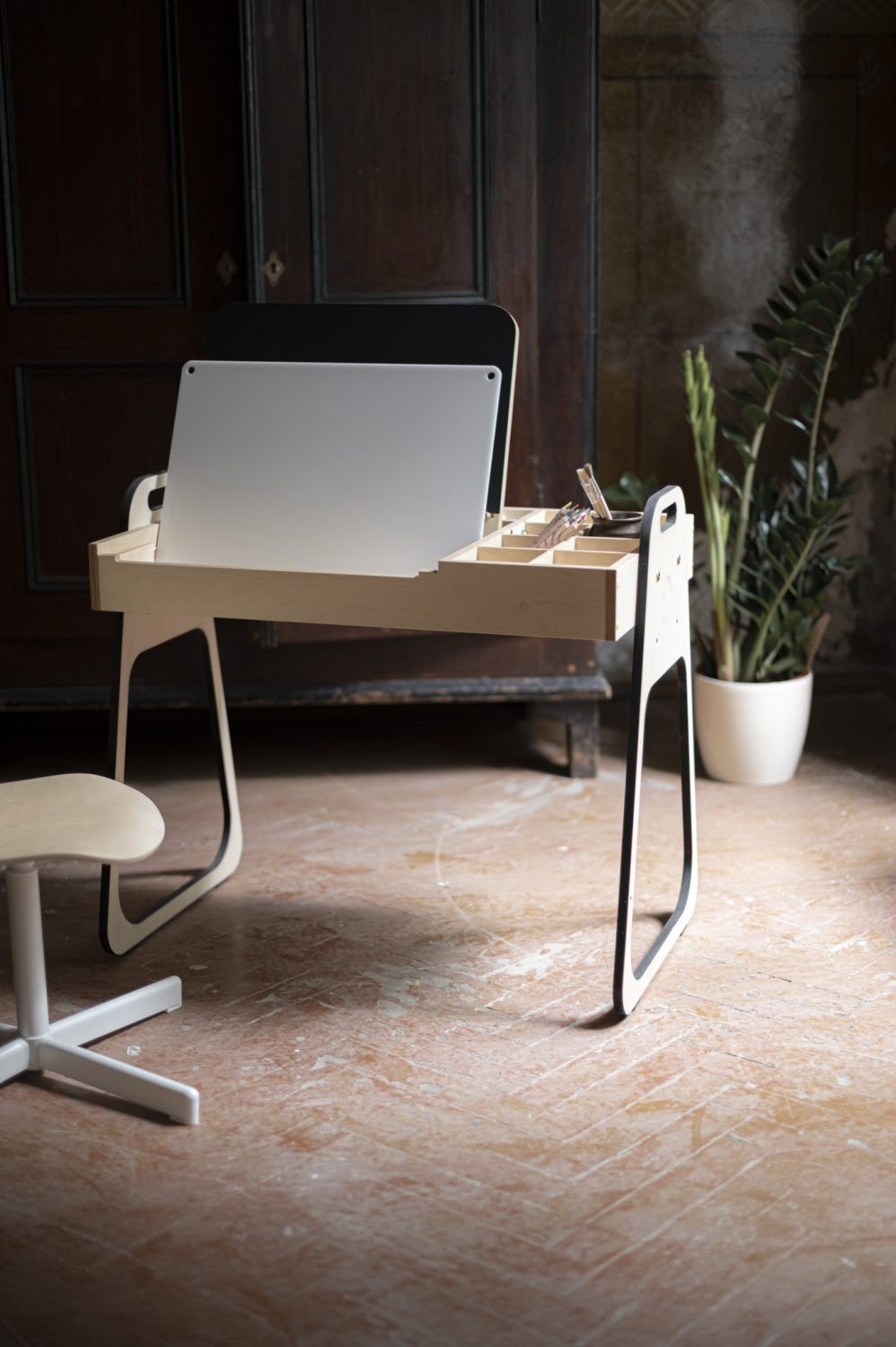 2. LUULA acrylic whiteboard on children's desk in rustic room with plant and chair