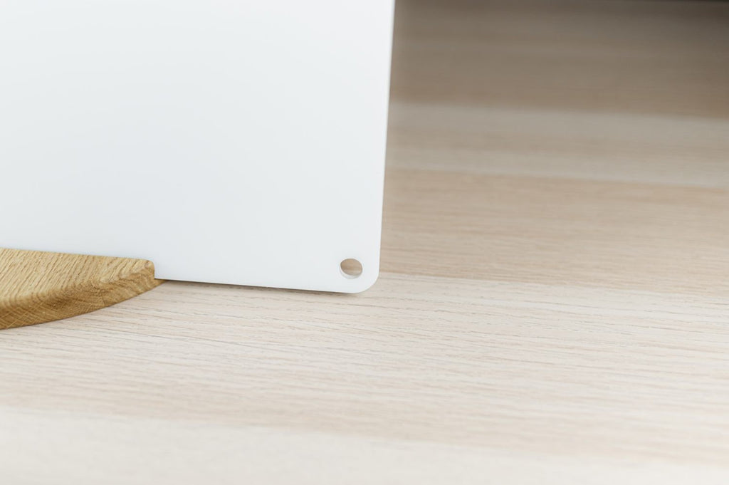 4. Detail of LUULA acrylic whiteboard corner on wooden surface