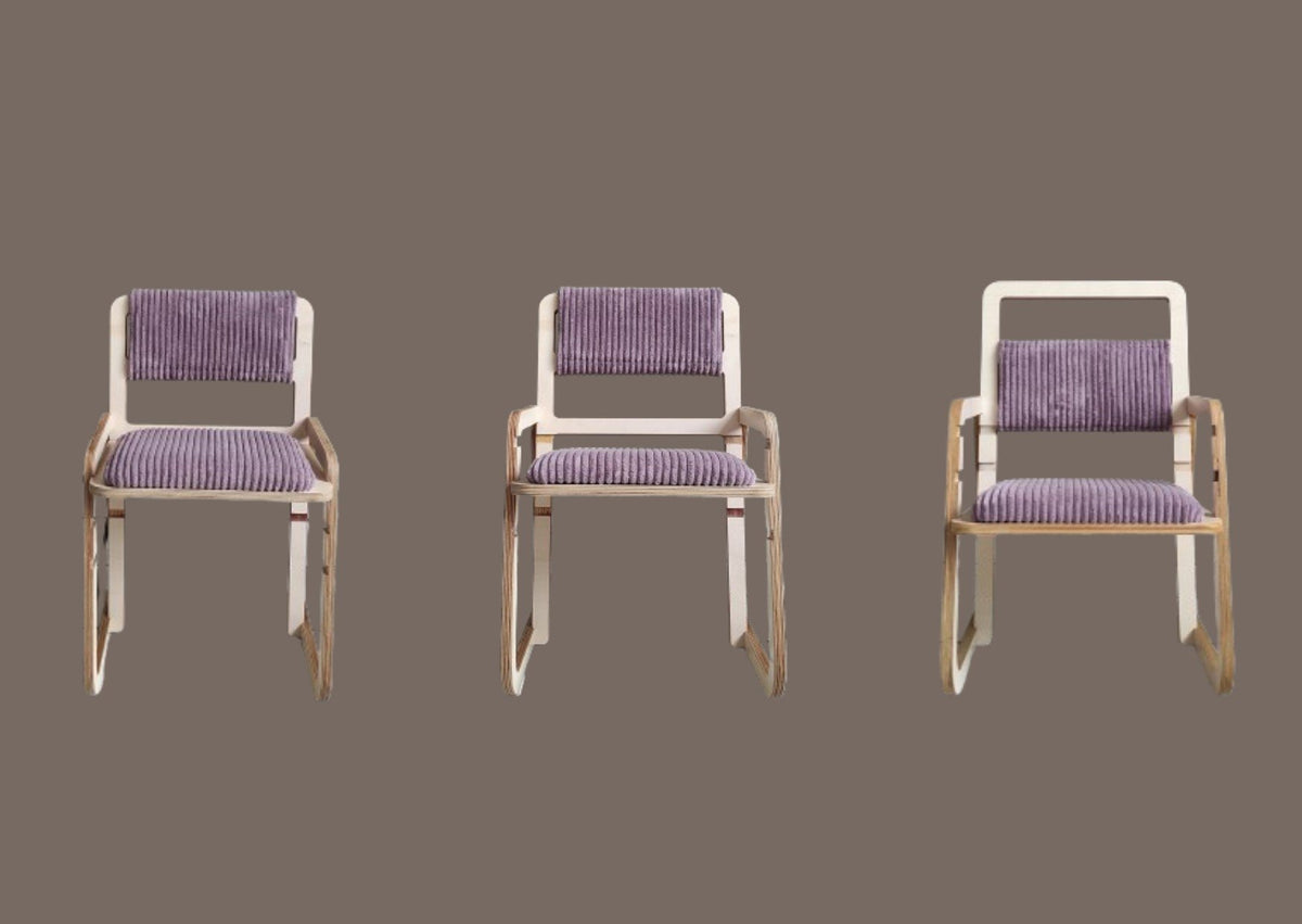 23. Luula Julle chair in cannon pink with armrests, designed for comfort