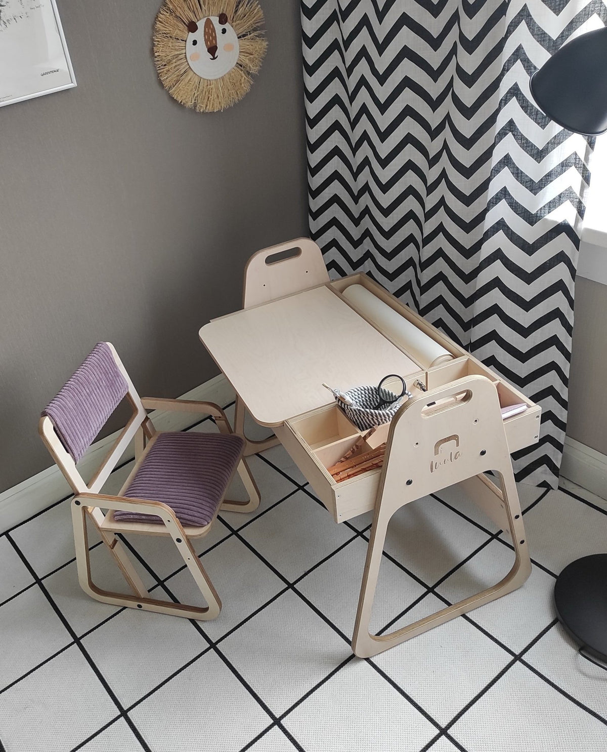 1. Children's table and chair set in cannon pink with chevron wallpaper and tiled floor, designed for Montessori learning