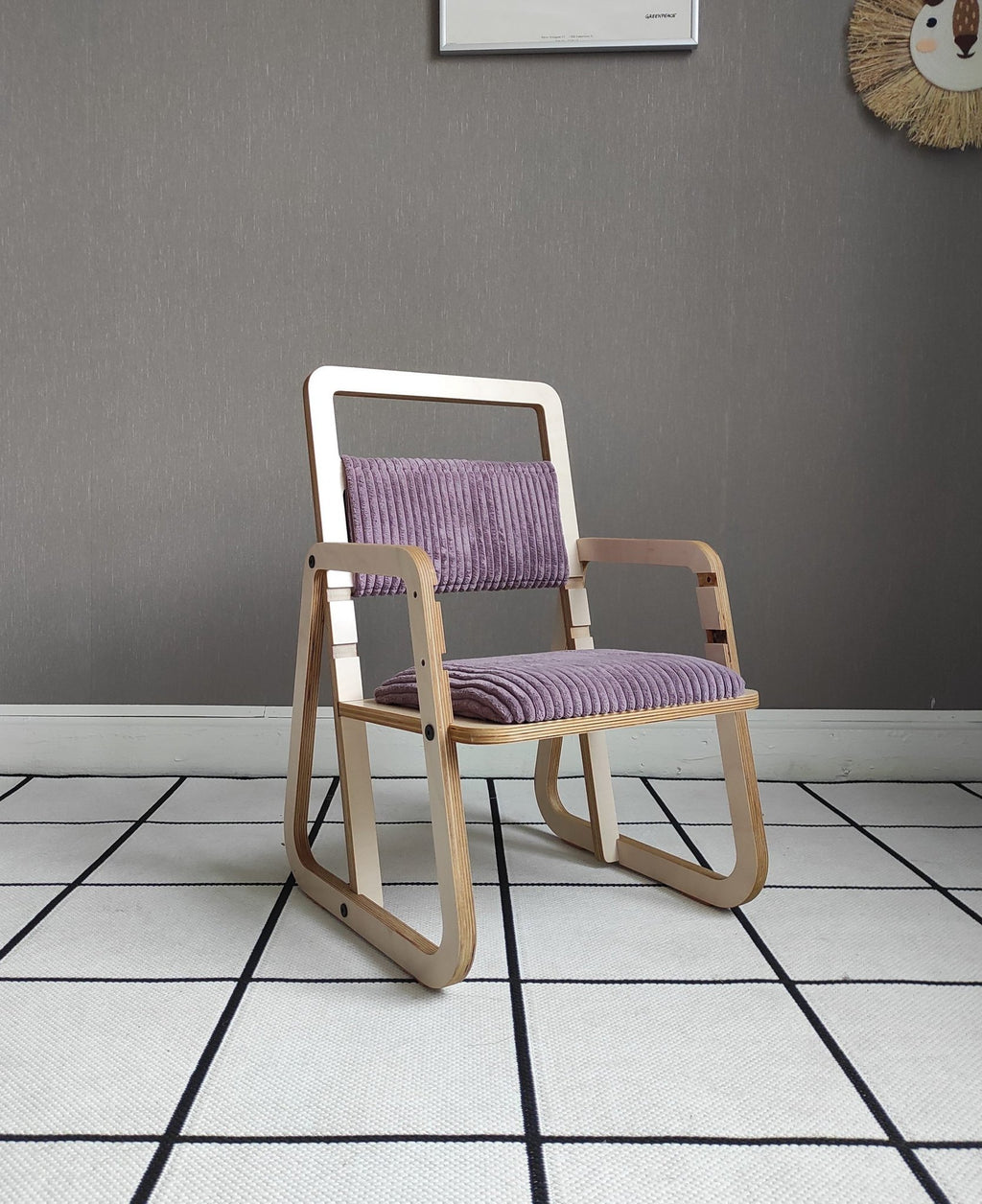 20. Luula Julle chair in cannon pink with cushioned seat, shown on tiled floor