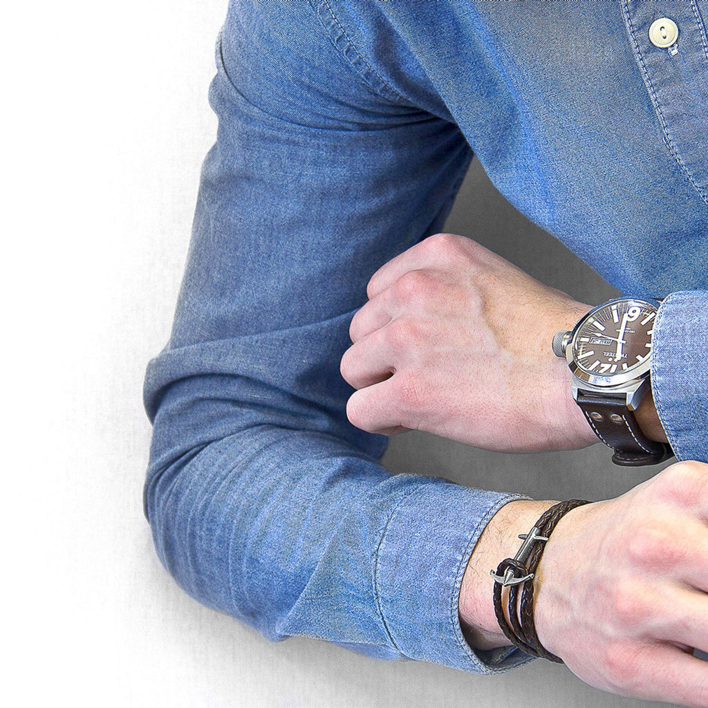 1. Men's Admiral Anchor silver and dark brown braided leather bracelet by ANCHOR & CREW, styled with a watch, shown on wrist