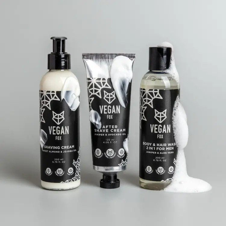 2. Vegan Fox men's grooming set featuring after shave cream, shaving cream, and 2-in-1 body and hair wash, displayed with foam