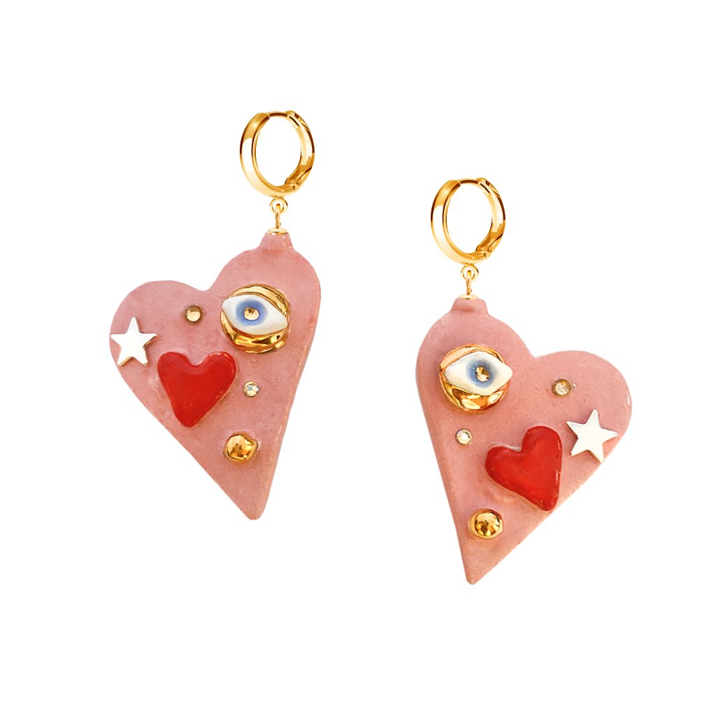 3. Studio image of SCULP All You Need Is Love earrings with handcrafted ceramic design and Swarovski accents