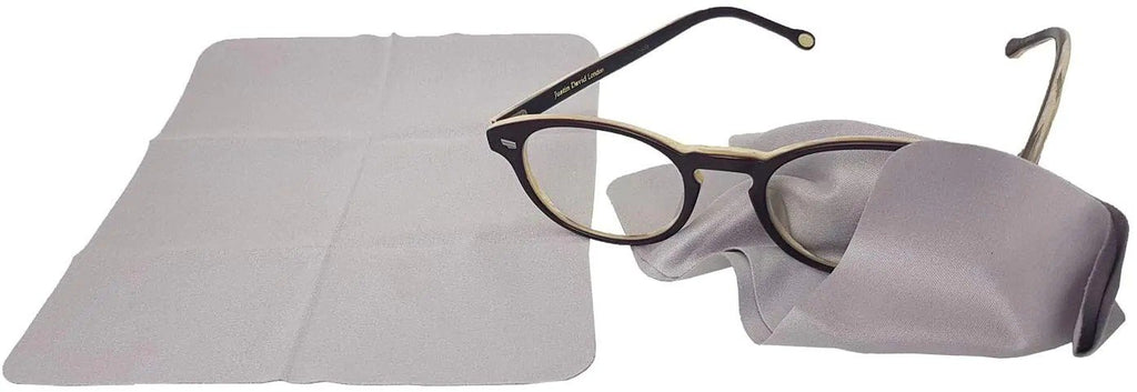 4. Flat lay of GoGoNano anti-fog cleaning cloth with eyeglasses, showing soft microfiber texture