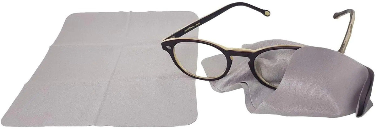 4. Flat lay of GoGoNano anti-fog cleaning cloth with eyeglasses, showing soft microfiber texture