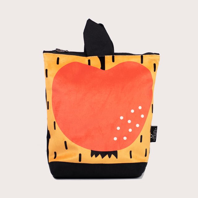 6. Close-up of Muni apple backpack, highlighting vibrant apple design and quality fabric