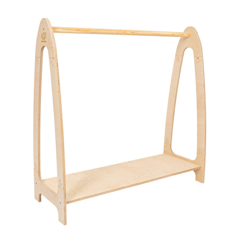 2. Natural wood arched clothing rack for children with shelf, studio setting