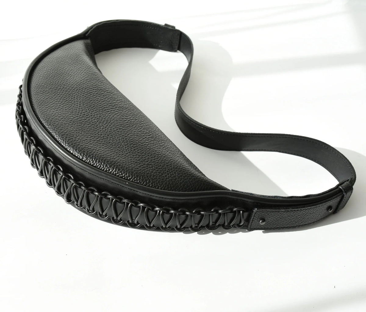 4. Studio shot of Gerda Retter Design Leather Bag Ateena in black, showing detailed craftsmanship