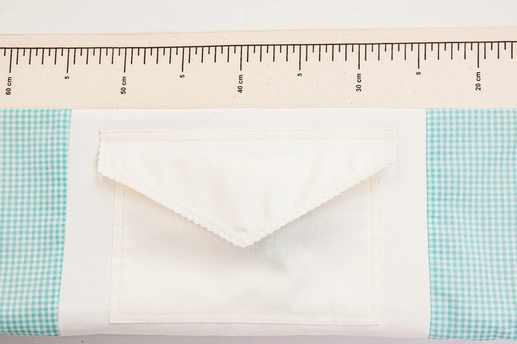 3. Close-up of ruler design and pocket detail on baby activity mat