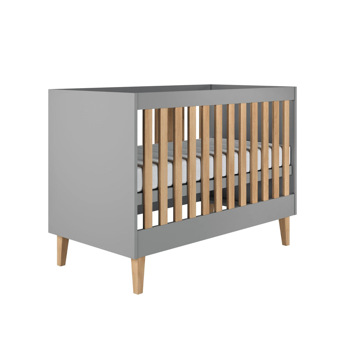 2. Grey baby cot with oak slats and legs shown in studio setting, highlighting Scandinavian design