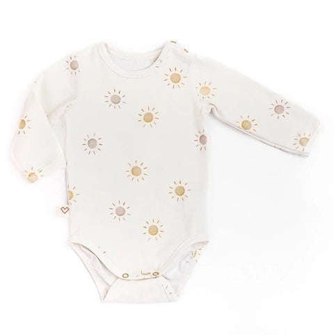 2. Flat lay of Karloova baby bodysuit with sun print on white background showing snap-button design