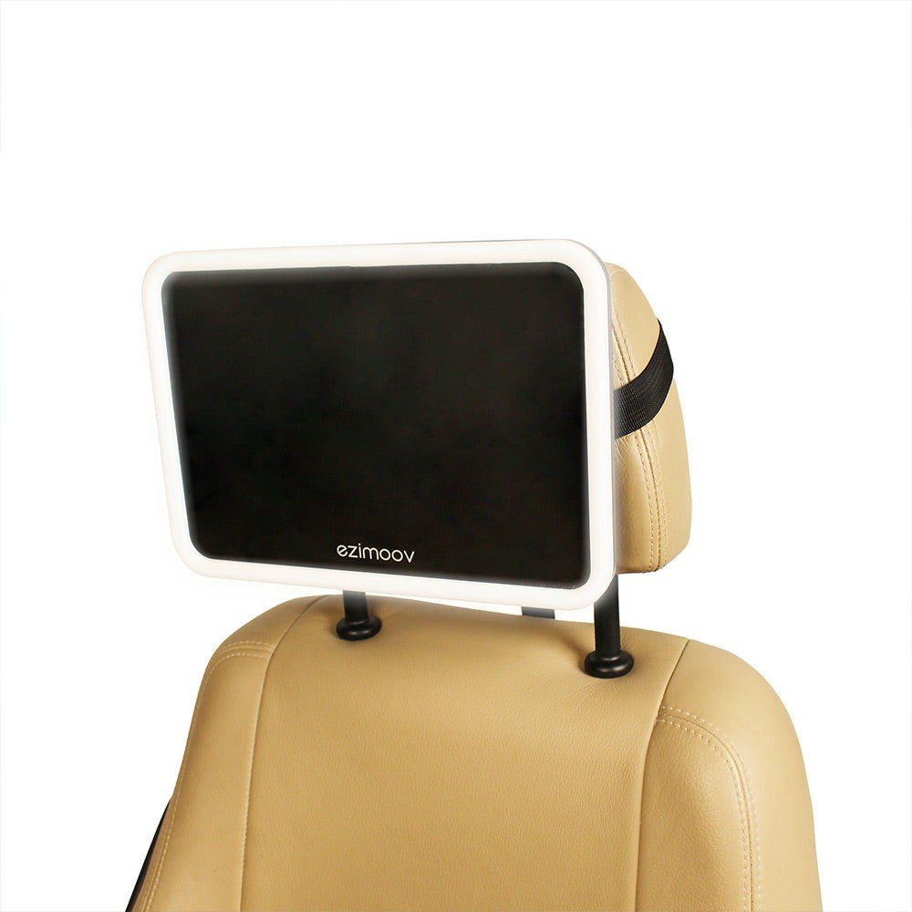4. Ezimoov LED car mirror mounted on beige car headrest, studio setting