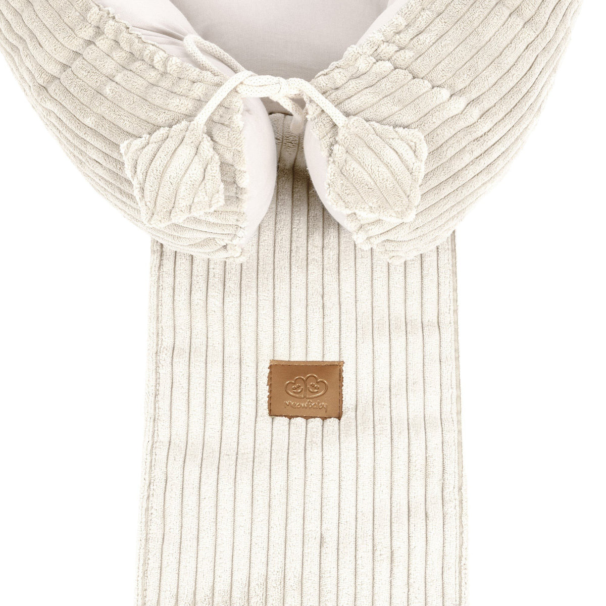 3. Close-up of ecru baby nest with ribbed texture and MeowBaby logo on fabric