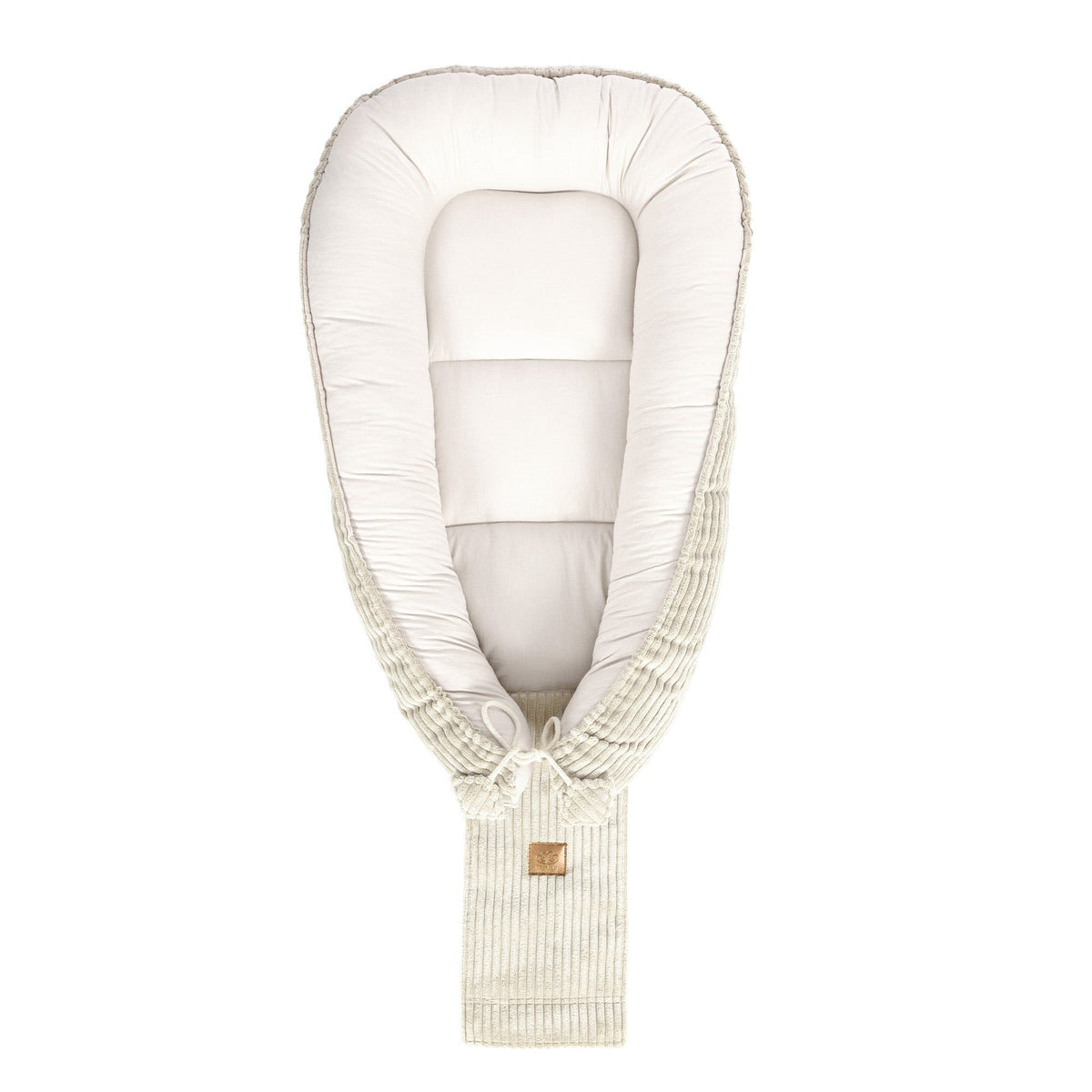 4. Ecru baby nest shown from top, featuring cushioned interior and ribbed exterior with MeowBaby logo