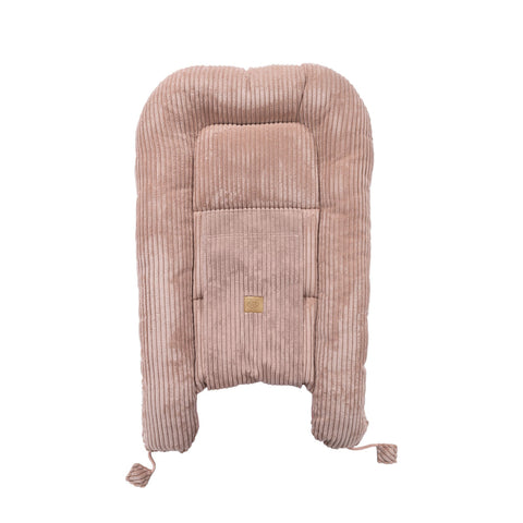 5. Flat lay of powder pink baby nest with ribbed texture, showing back view and MeowBaby logo