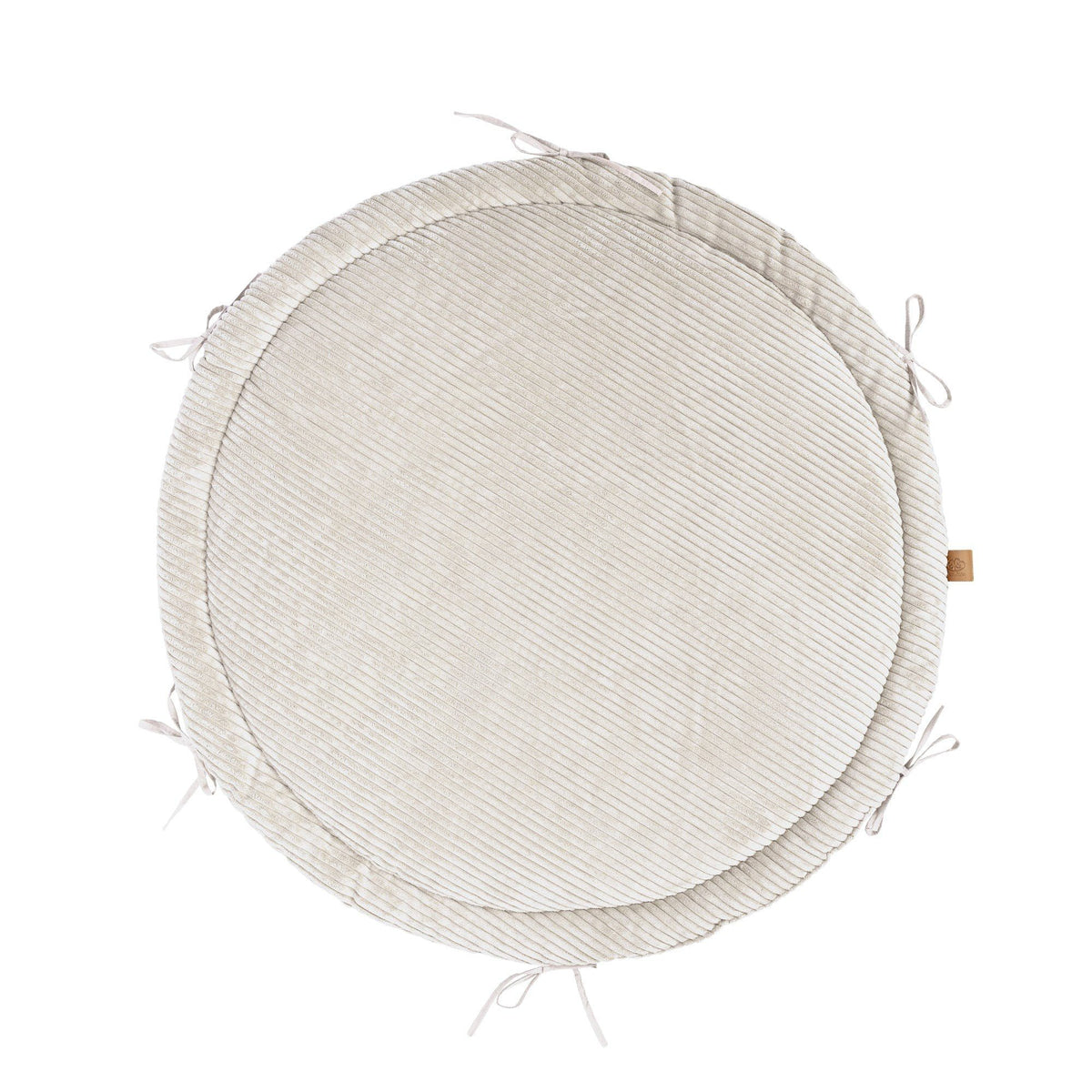 2. Ecru round play mat with ribbed texture and tie strings, shown from top view