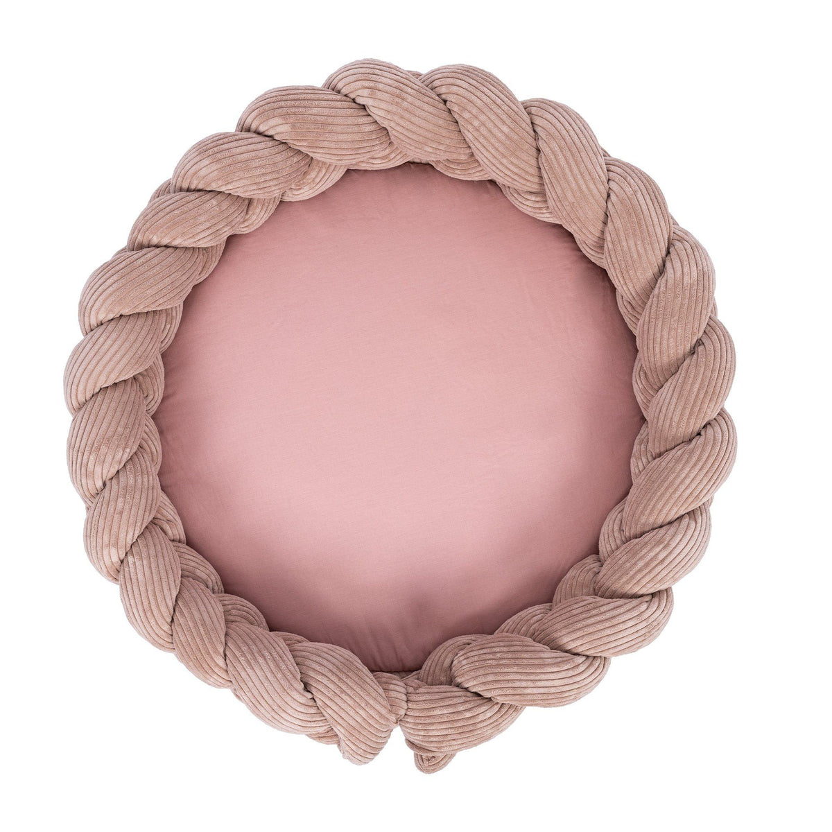 1. Powder pink baby nest with braided crib bumper in ribbed corduroy, shown from top view