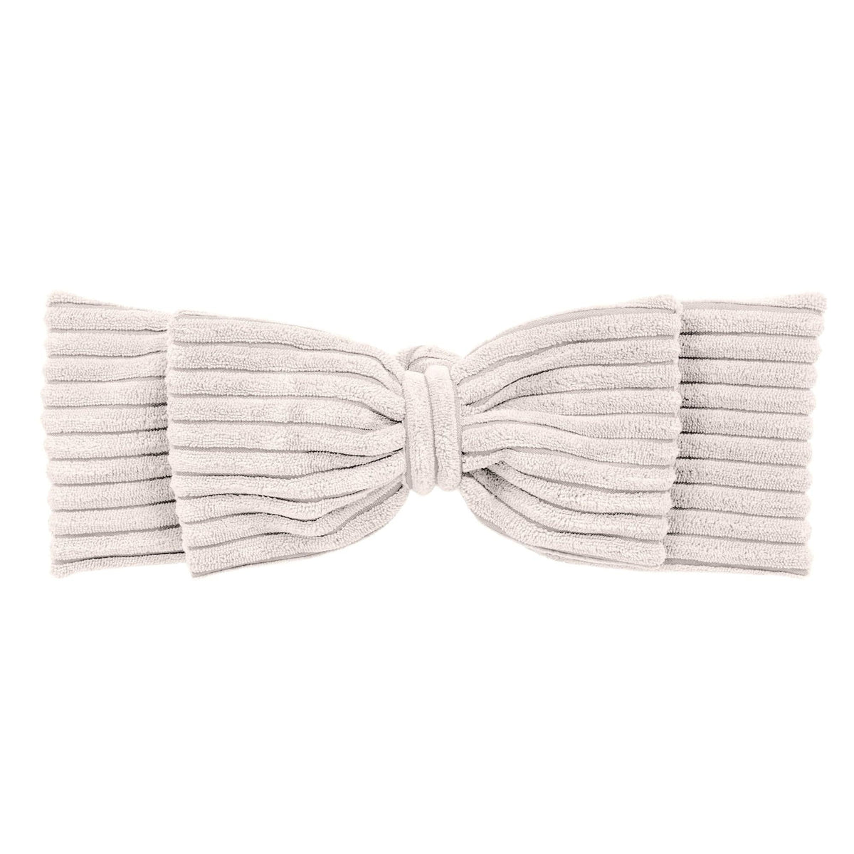 3. Close-up of ecru braided bumper in textured corduroy with bow detail